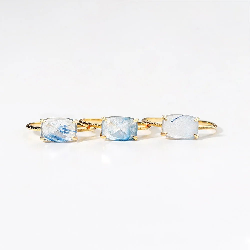 Quartz  rings with a visible brand logo on a white background