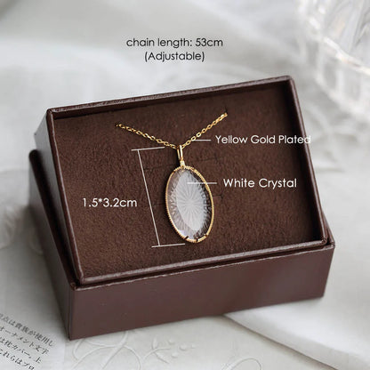 natural white crystal necklace with oval pendant in jewelry box