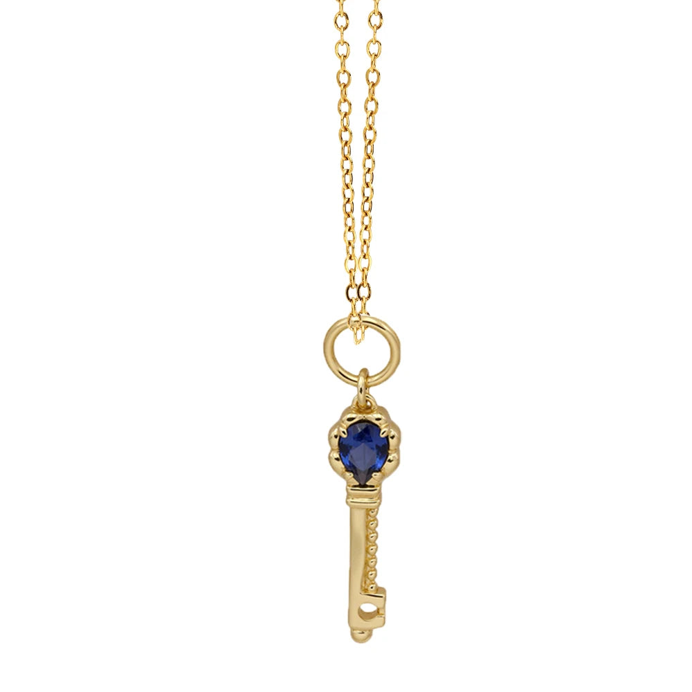 Blue corundum key necklace with faceted synthetic corundum stone