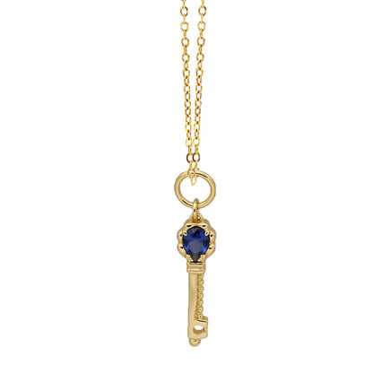 Blue corundum key necklace with faceted synthetic corundum stone