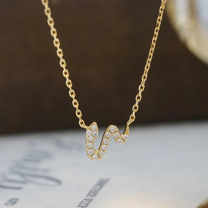 14kt gold plated serpent necklace with colourful cubic zirconia accents