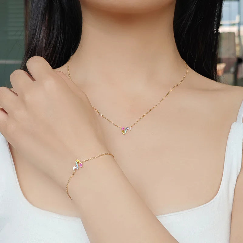 serpent necklace worn with matching bracelet