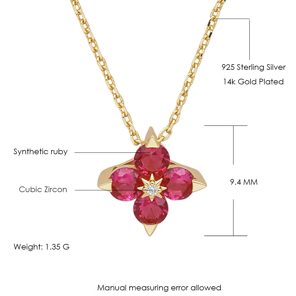 Gold necklace with red gemstone pendant and measurements on a white background