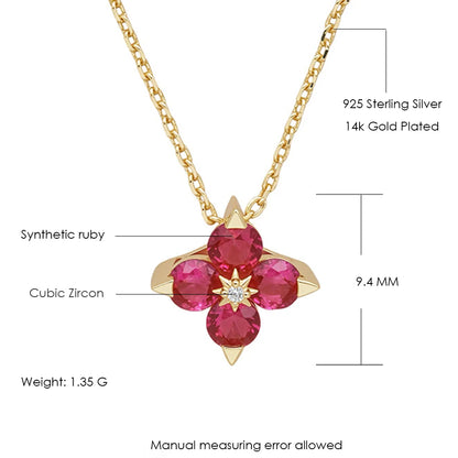 Gold necklace with red gemstone pendant and measurements on a white background