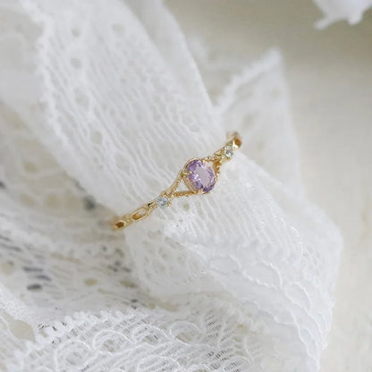 natural amethyst ring with carved vintage setting on lace