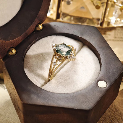 Natural moss agate ring with unique green inclusions in jewelry box