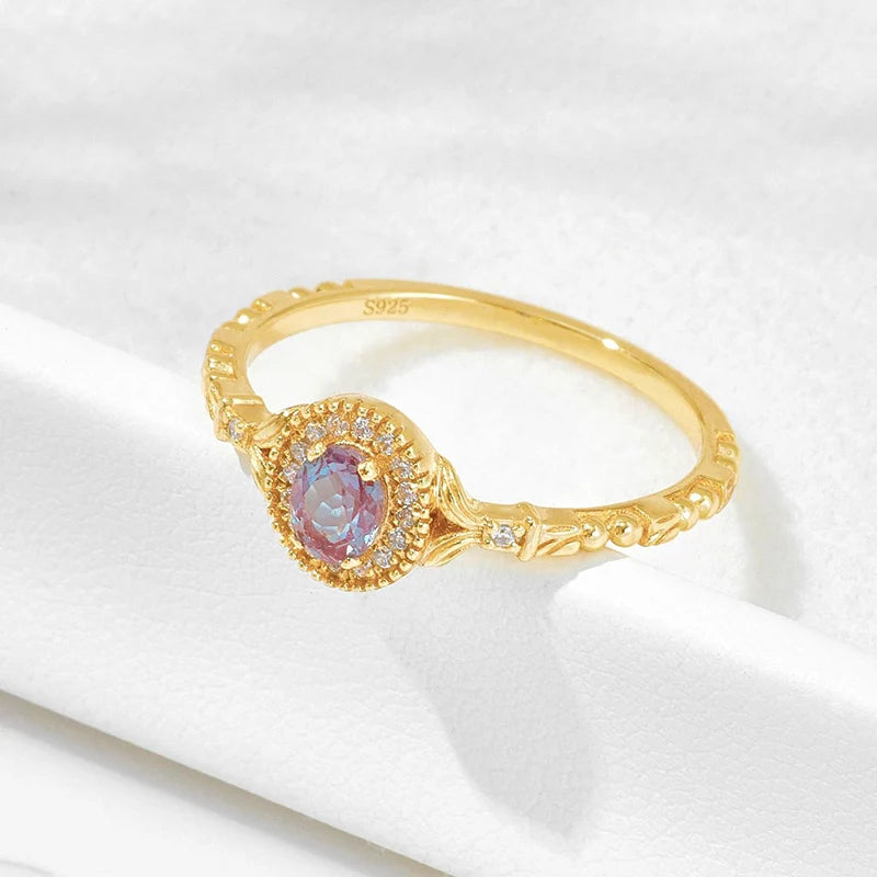 Oval alexandrite ring with zircon accents in 14K gold plated 925 silver