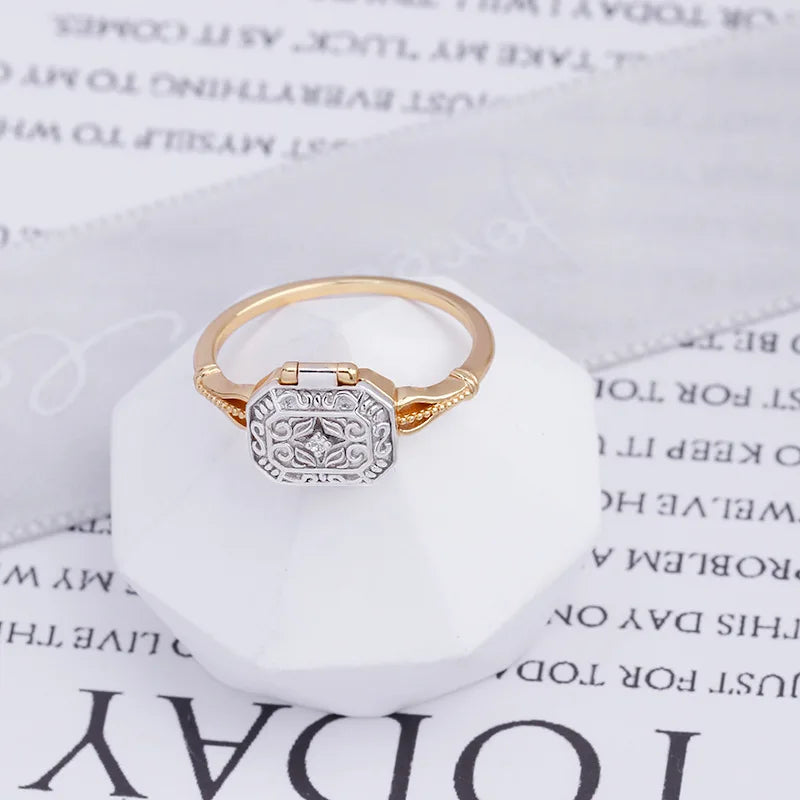 925 sterling silver vintage ring with carved pattern on paper