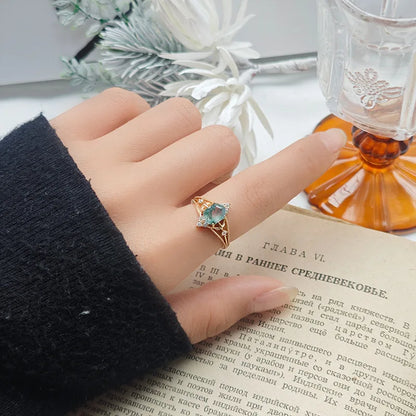 Green moss agate gemstone ring with natural fern-like inclusions
