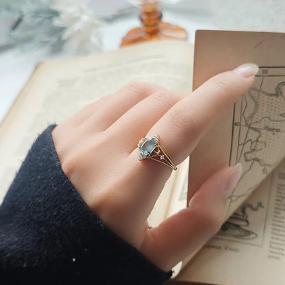 Natural green gemstone ring with moss agate worn on hand
