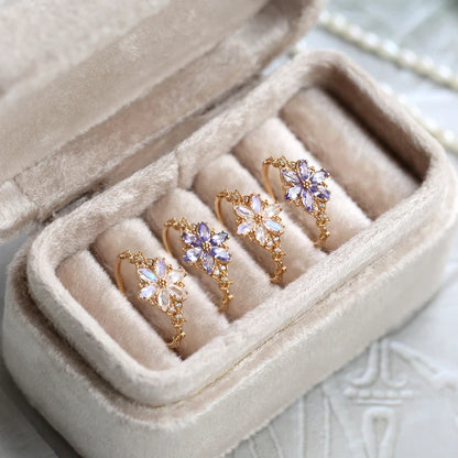 natural moonstone and tanzanite ring with zircon side stones