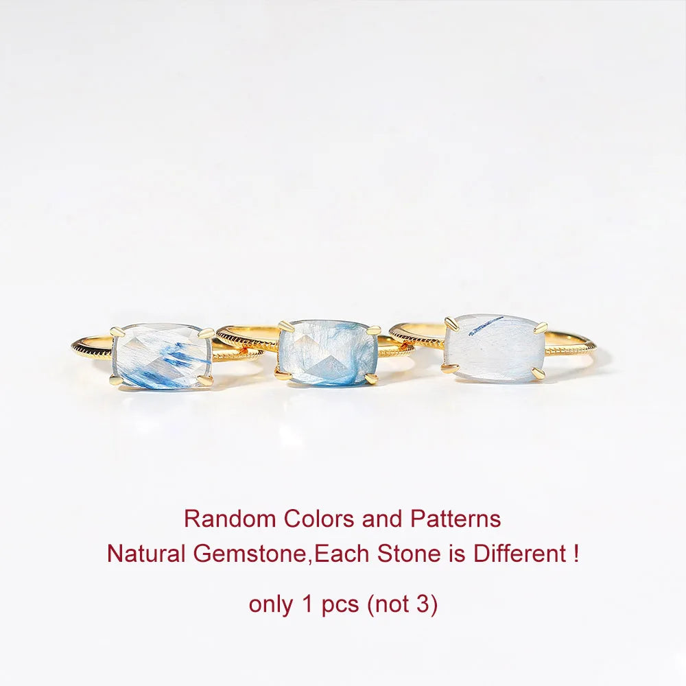 Gold Quartz rings with three natural gemstones on a white background