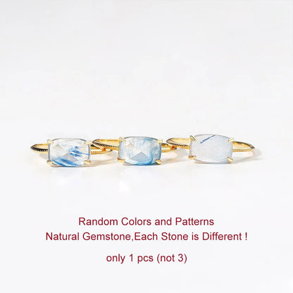 Gold Quartz rings with three natural gemstones on a white background
