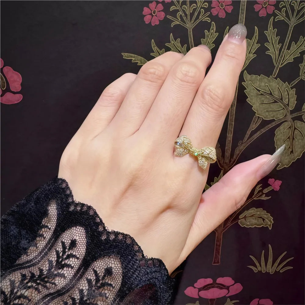 gold plated cubic zirconia bow ring with pavé setting