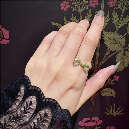 gold plated cubic zirconia bow ring with pavé setting