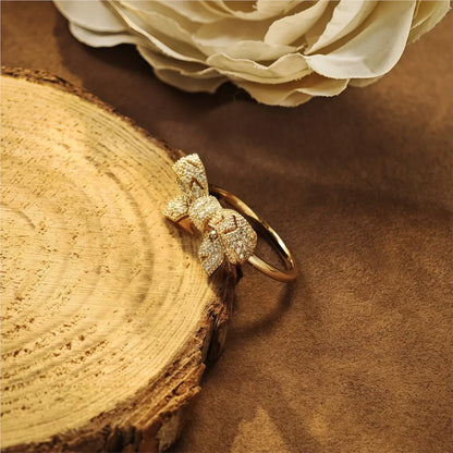 14K gold plated bow ring with sparkling cubic zirconia stones