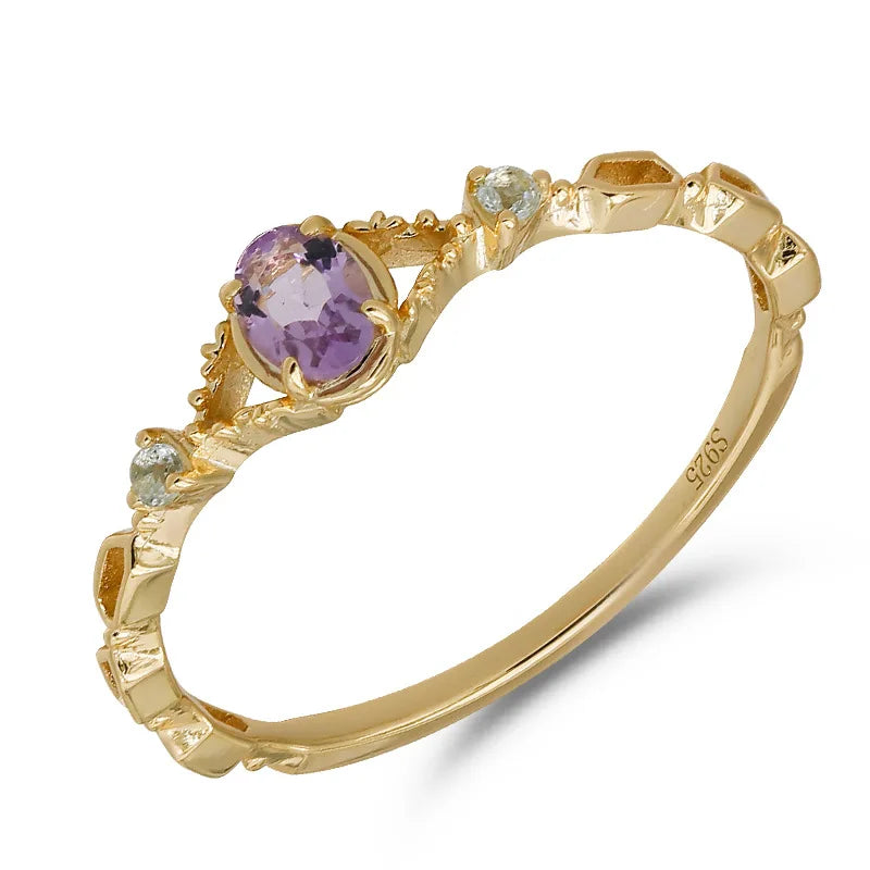 natural amethyst ring with oval purple gemstone in gold plated setting