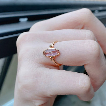 Natural tanzanite ring worn on hand in 14K gold plated silver