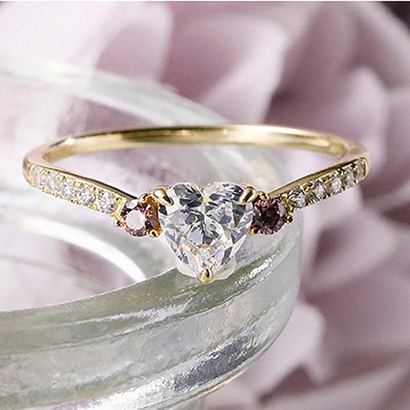 heart shaped cubic zirconia ring with sparkling side stones