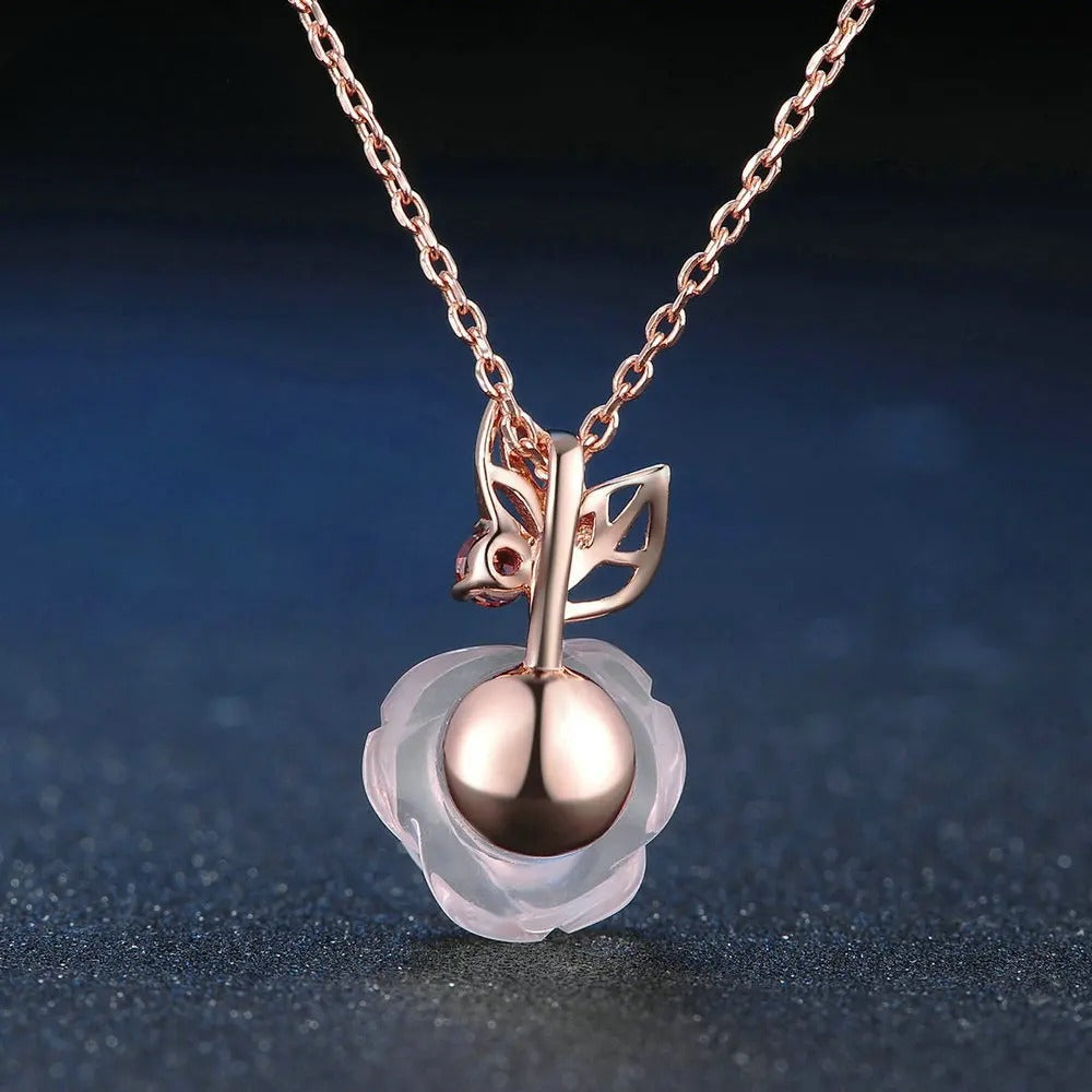 Close-Up of Rose-Shaped Quartz Pendant with Rose Gold Finish